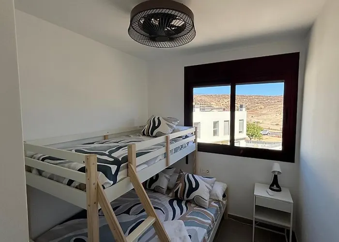 アパート Adosado